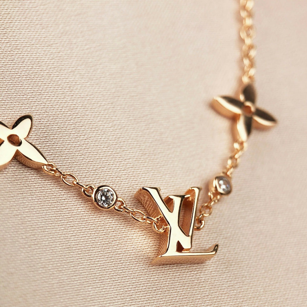 ¡®Loco¡¯STAR AND SUN 7 MOTIFS GOLD BRACELET