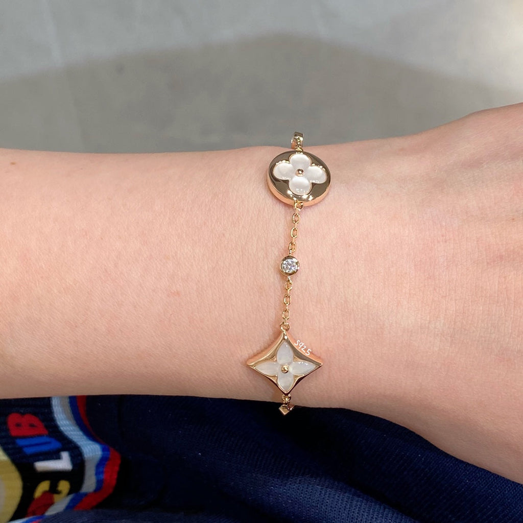 ¡®Loco¡¯STAR AND SUN 4 MOTIF WHITE MOP PINK GOLD BRACELET
