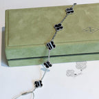 ¡®Loco¡¯CLOVER 5 MOTIF VEINED ONYX BRACELET SILVER